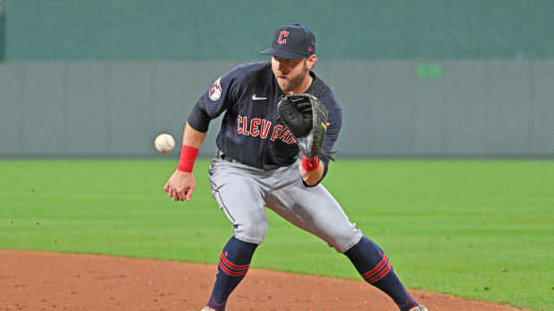 Sep 7, 2022; Kansas City, Missouri, USA; Cleveland Guardians first baseman Owen Miller (6) fields a ground ball during the fifth inning against the Kansas City Royals at Kauffman Stadium. Mandatory Credit: Peter Aiken-USA TODAY Sports